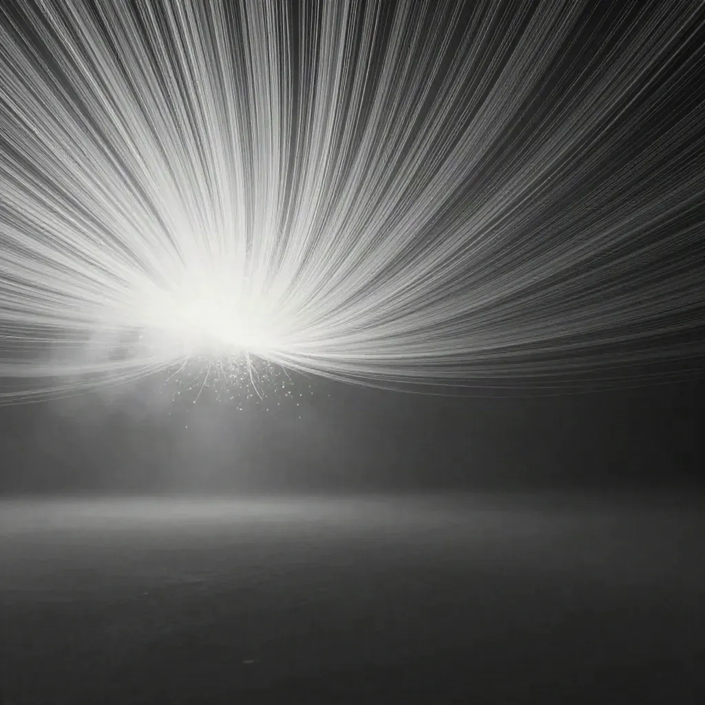 Silver light filaments converge into a white bloom in dark graphite haze.